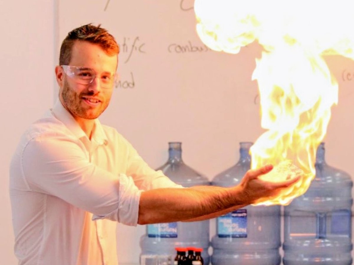 Mr Harvey demonstrating a flame experiment in class